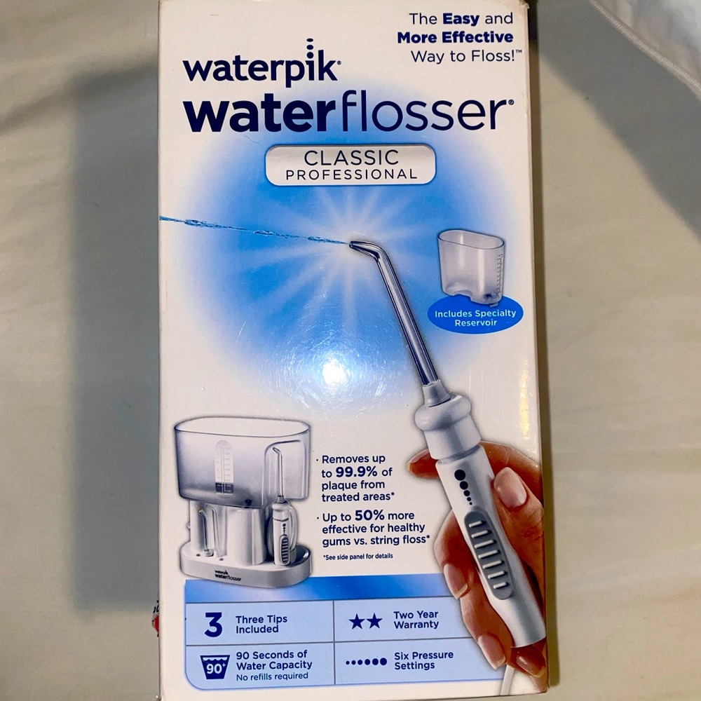 WATERPICK : WATER FLOSSER NEW, UNOPENED